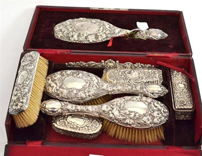 Lot 512 - Seven piece silver dressing table set in fitted case, London 1902