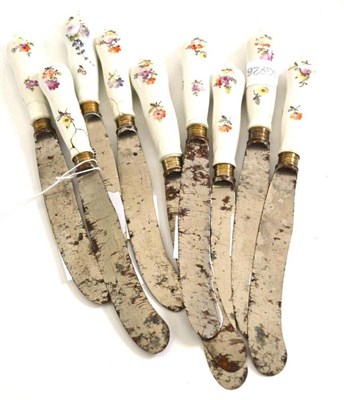 Lot 520 - Set of nine German porcelain handled knives, painted with flower sprays, probably late 18th century