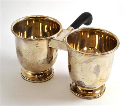 Lot 538 - An Irish silver condiment holder, Dublin 1969, with an ebonised handle and two compartments