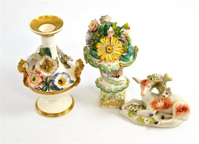 Lot 555 - A 19th century Minton porcelain flower encrusted campana vase, 13.5cm high; another flower...