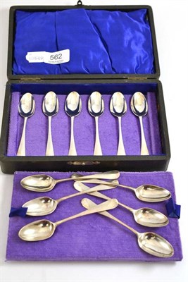 Lot 562 - Set of six George III silver picture back teaspoons, circa 1760; and six similar George II...