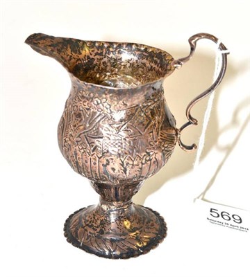 Lot 569 - George III silver helmet shaped jug, London 1783, 10.5cm high