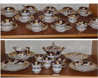 Lot 598 - A 19th century Staffordshire porcelain tea and coffee service, with blue and gilt decoration (36)