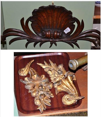 Lot 603 - A 18th century carved oak shell cresting and a pair of giltwood cornucopias