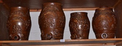 Lot 604 - Four 19th century saltglaze barrels of assorted sizes, 34cm, 31cm, 29cm and 26cm