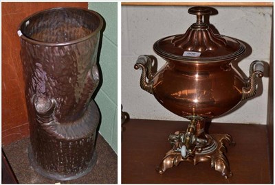 Lot 608 - Copper stick stand in the form of a tree stump, 57cm high and a tea urn