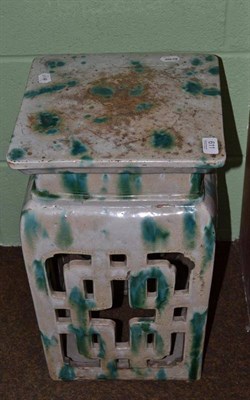 Lot 611 - Oriental green and grey ceramic garden seat, 50cm high