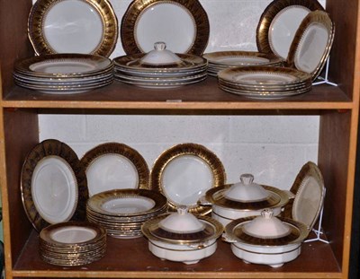 Lot 614 - An Ashworths Brothers blue and gilt decorated dinner service