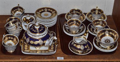 Lot 615 - A Staffordshire porcelain blue and gilt decorated tea service