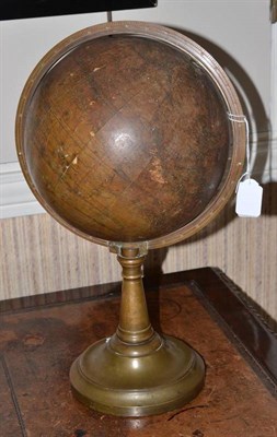 Lot 618 - A 19th century terrestrial globe with brass ring, turned support, 40cm high