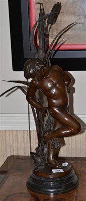 Lot 619 - A bronze figure of a nude boy standing before bulrushes, slate plinth, 64cm high