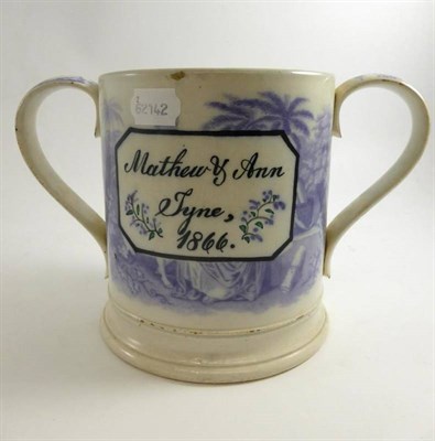 Lot 627 - A Victorian pottery frog loving cup, inscribed 'Matthew & Ann Tyne, 1866', 18cm high