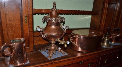 Lot 653 - A brass samovar, 54cm high; copper cooking pot, 52cm wide; copper kettle and jug; brass teapot...