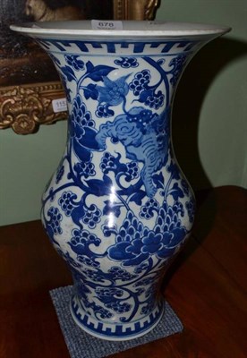 Lot 678 - A Chinese blue and white vase decorated with Dog of Fo, 38cm high