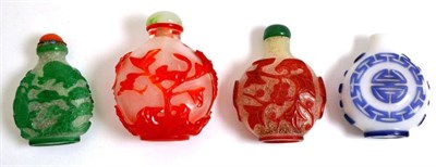 Lot 694 - Four Chinese overlay glass snuff bottles