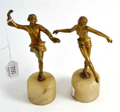 Lot 700 - A pair of Art Deco gilt metal figures of dancers, 17cm high