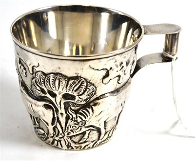 Lot 710 - A white metal cup probably Dutch decorated in relief with bulls height 7.5cm