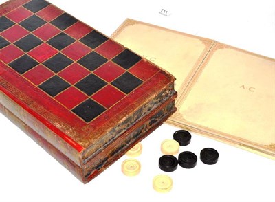 Lot 711 - A 19th century draughts and backgammon board in the form of two volumes of The Life of Lord...