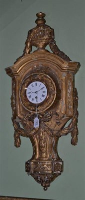 Lot 720 - A gilt wood wall timepiece, 19th century, urn and swag decorated case, enamel dial, single...