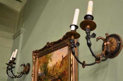 Lot 725 - Pair of 19th century two branch bronze wall lights