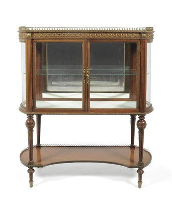 Lot 742 - A Louis XVI/transitional style mahogany and gilt metal mounted vitrine, late 19th century, the...