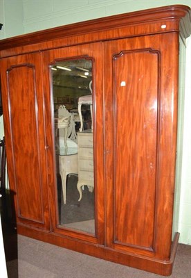 Lot 748 - Victorian mahogany triple door wardrobe, 198cm wide