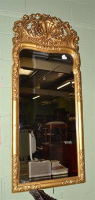 Lot 752 - Painted gilt pier glass with shaped plate and a pierced Rococo and shell pediment