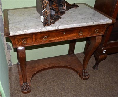 Lot 754 - A 19th century mahogany marble top dressing table, 89cm wide