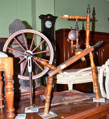 Lot 766 - A 19th century fruitwood turned spinning wheel