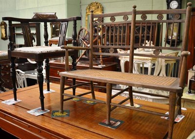 Lot 775 - Edwardian inlaid mahogany child's chair and a cane seated child's sofa