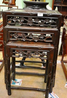 Lot 782 - A nest of three Chinese hardwood side tables, largest 44cm wide