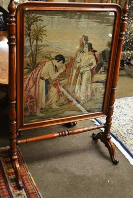 Lot 796 - Victorian mahogany fire screen with needlework panel depicting a religious scene