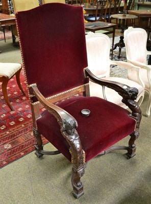 Lot 811 - Italian walnut armchair in 17th century style with carved cherub support