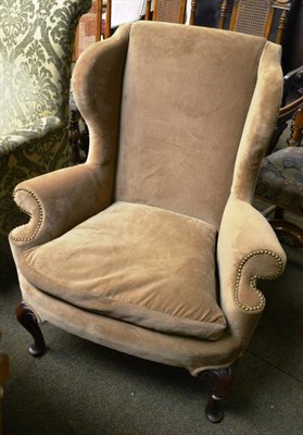 Lot 815 - Wing chair recovered in modern brown fabric