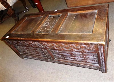 Lot 843 - Joined oak box bearing date 1690, with carved panel front