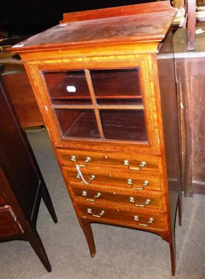 Lot 864 - An early 20th century crossbanded mahogany music cabinet, 51cm