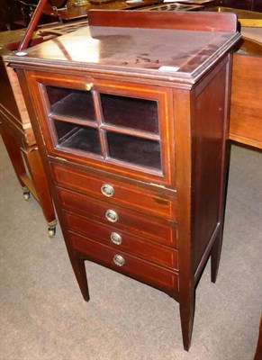 Lot 865 - An early 20th century crossbanded mahogany music cabinet, 53cm