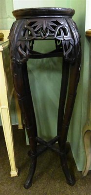 Lot 880 - Early 20th century Chinese carved plant stand