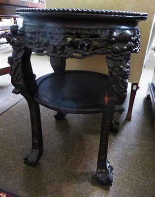 Lot 898 - Early 20th century circular Chinese plant stand with pink marble top