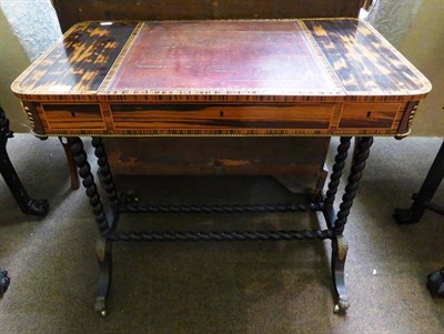 Lot 899 - Regency coromandel and ebonised writing table, fitted with three frieze drawers