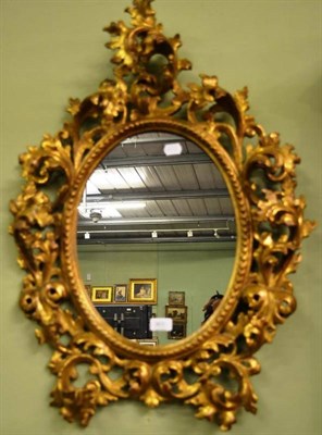 Lot 905 - Florentine carved wood mirror