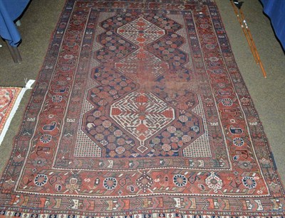 Lot 909 - Kashgai rug, South West Persia, the indigo field with three medallions surrounded by tribal...