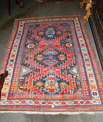 Lot 912 - Karabagh rug, South East Caucasus, the field with three serrated stepped medallions surrounded...