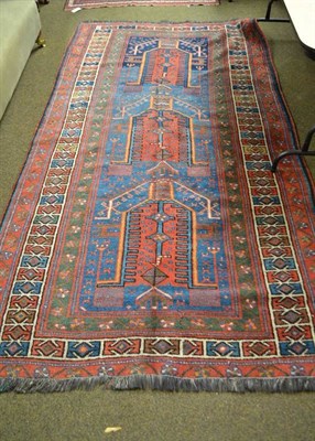 Lot 926 - Kurdish Prayer rug, North East Anatolia, the abrashed indigo field with a column of Mihrabs...