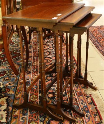 Lot 933 - ^ Three Edwardian mahogany and satinwood banded nesting tables