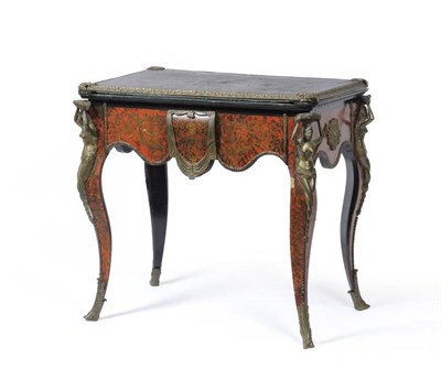 Lot 938 - A 19th century red tortoiseshell and brass Boulle style games table with figural mounts, 80cm wide