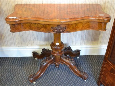 Lot 947 - Victorian walnut fold over card table, 93cm wide