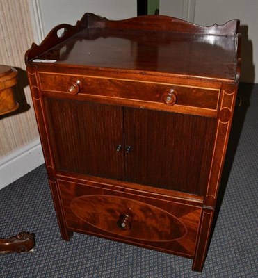 Lot 951 - George III mahogany tambour front commode