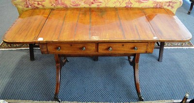 Lot 958 - George III mahogany sofa table with key