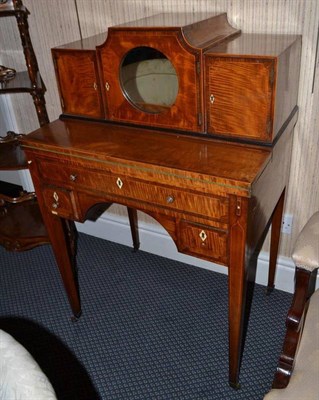 Lot 982 - A late George III mahogany and rosewood crossbanded lady's writing desk, circa 1820, the...